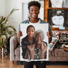 Load image into Gallery viewer, Custom art canvas wrap depicting a young black boy posing for a picture with his grandparent grandmother grandma. The custom artwork canvas wrap is being held and shown off by the same black boy now a college student and he is smiling at the camera while displaying his custom art canvas wrap.